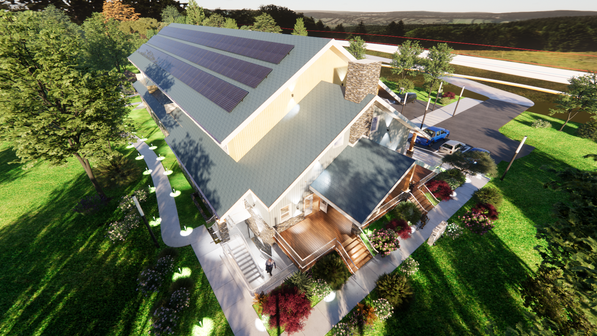 Aerial view of Ken Sargent House with rooftop solar; warm wood entry deck with ramp and stairs
